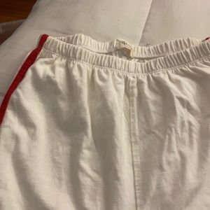 White sweats with red stripes